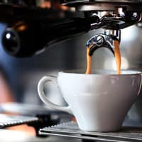Espresso pouring into a cup